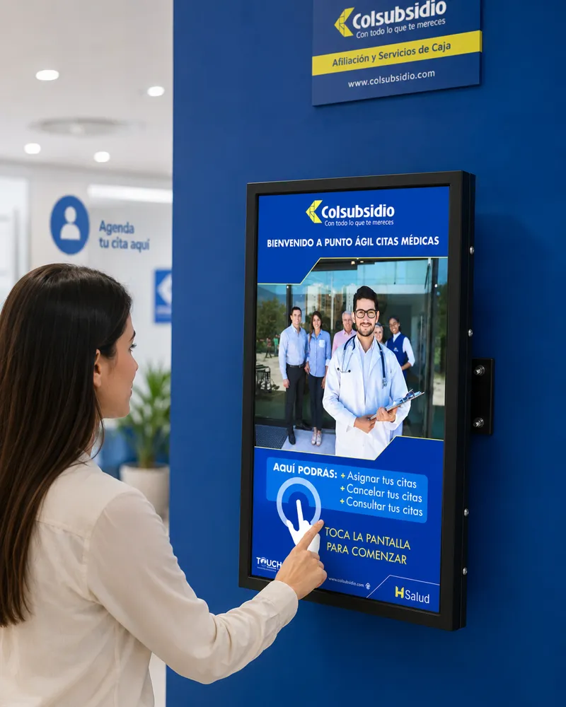 Pantalla de pared TouchColombia para agendamiento de citas instalada en producción